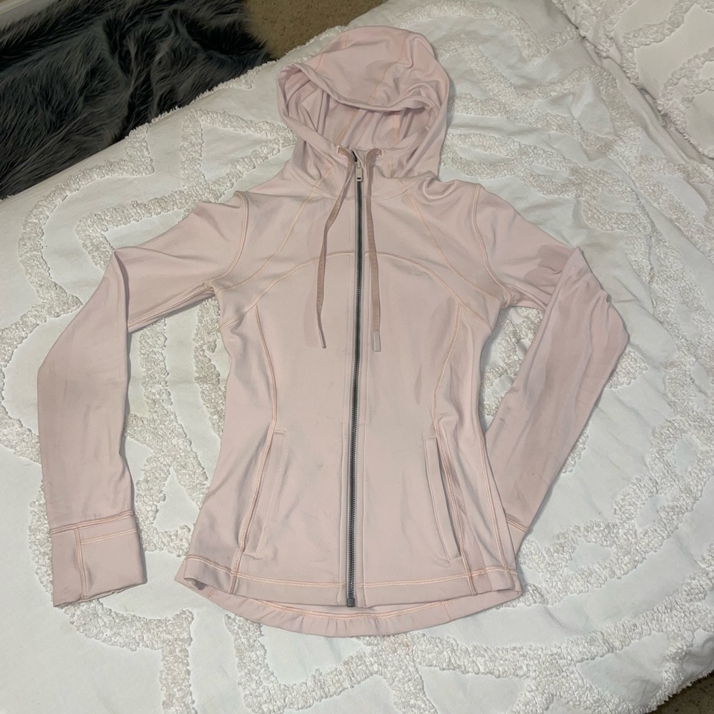 brand new LULULEMON jacket. work once perfect condition